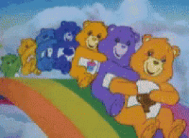 a bunch of care bears sitting on a rainbow