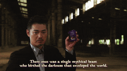 a man in a suit is holding a purple object with a caption that says there once was