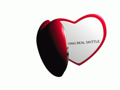 a heart shaped mirror with the words stop saying real skittle on it