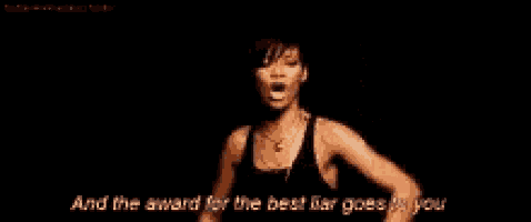 a woman in a black tank top is giving the middle finger and the award for the best liar goes to you .