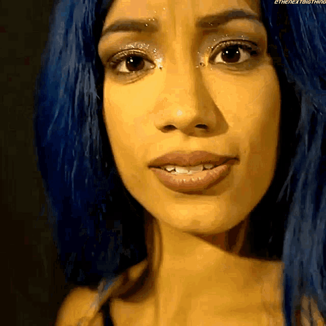 a close up of a woman 's face with the words " the next thing " on the bottom