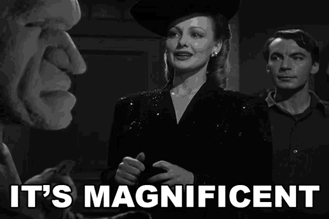a black and white photo of a woman and a man with the caption " it 's magnificent "