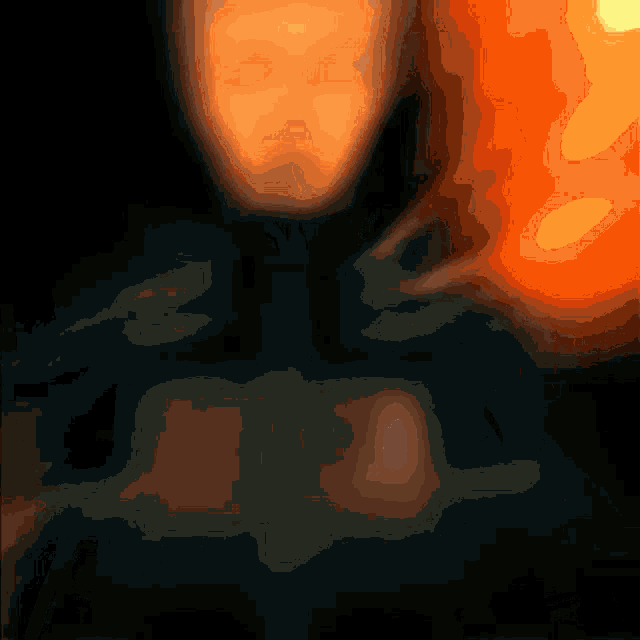 a blurry picture of a person 's face with a glowing orange object in the background