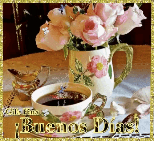 a cup of coffee next to a vase of pink roses with the words buenos dias