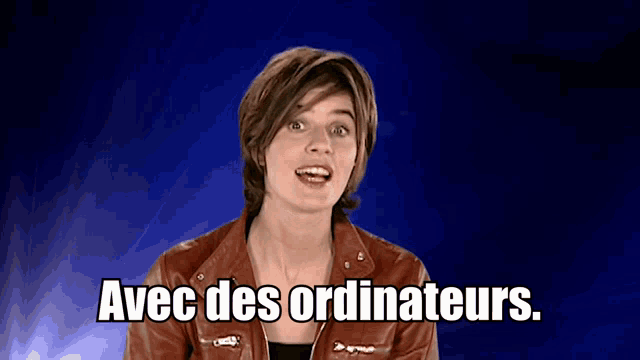 a woman in a red leather jacket says " avec des ordinateurs "