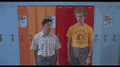 two men are standing in front of lockers and one of them is wearing a yellow shirt that says rick college