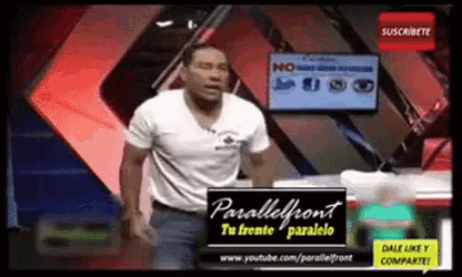 a man is standing in front of a screen that says parallelfront