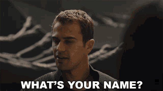 a man is asking what 's your name in a dark room