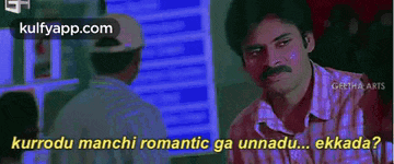 a man with a mustache is talking to another man with the words kurrodu manchi romantic ga unnadu ... ekkada .