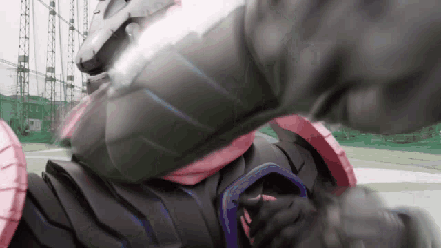 a close up of a person 's torso with a purple ring around it