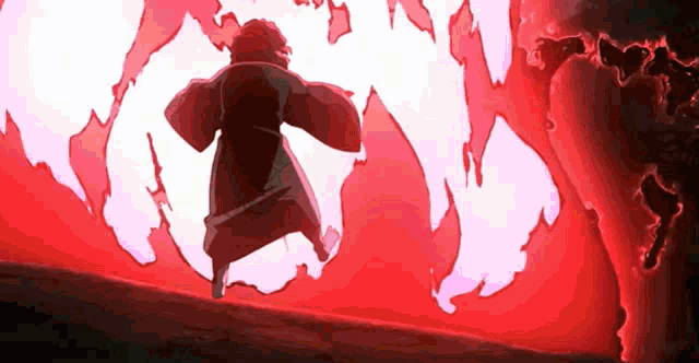 a person in a red kimono is running through a red fire .
