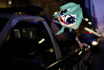 a police car with a clown mask on the driver 's seat