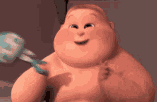 a cartoon baby is holding a toothbrush and smiling .