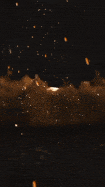 a large explosion in the sky with a glowing light coming out of it