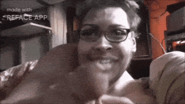 a man wearing glasses is making a funny face with reface app