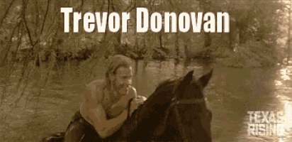 a shirtless man is riding a horse in a river with the name trevor donovan written above him