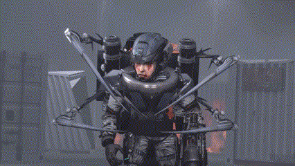 a man in a futuristic suit is holding a sword and a rocket .