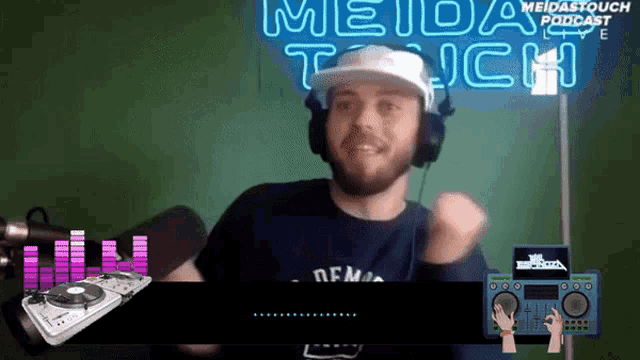 a man wearing headphones is dancing in front of a neon sign that says meida touch podcast
