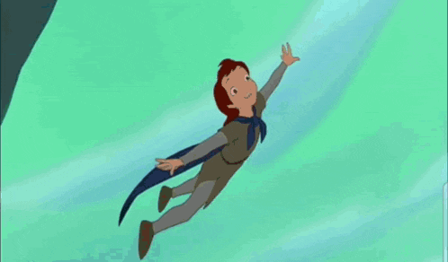 a boy in a superhero costume is flying through the air with his arms outstretched