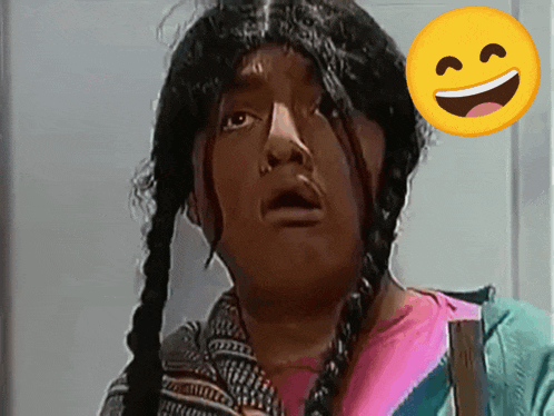 a woman with braids has a smiley face on her face