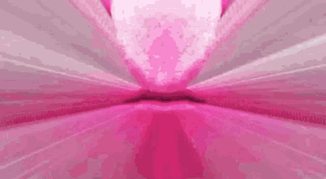 a cartoon drawing of a woman 's mouth with a pink background and rays coming out of it .