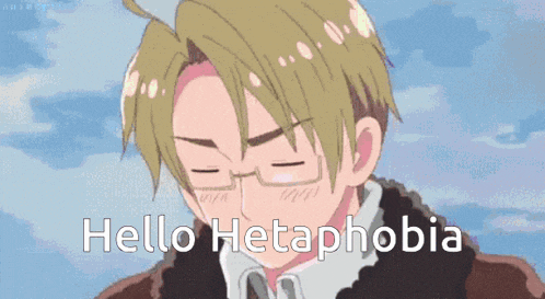 a man with glasses is saying hello hetaphobia in front of a blue sky .