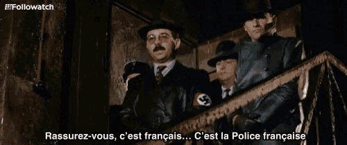 three men standing on a balcony with the caption " rassurer-vous c'est francais..c'est la police francaise "