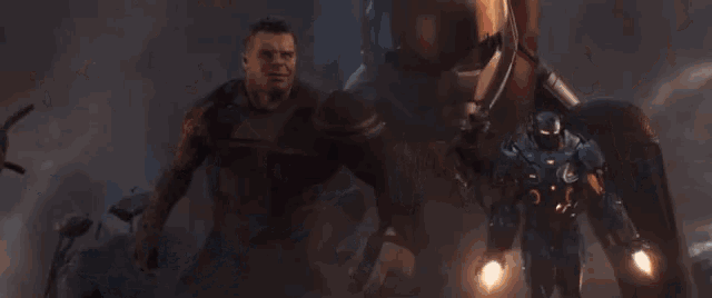 captain america is smiling while standing in front of a crowd of people .