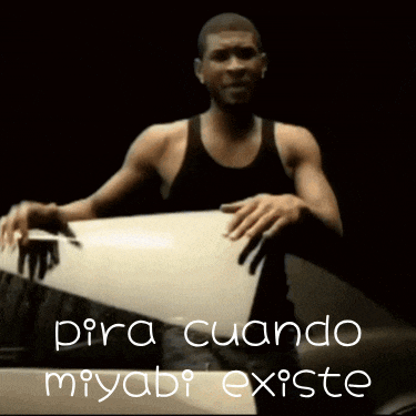 a man in a black tank top is holding a piece of paper with the words pira cuando miyabi existe written below him