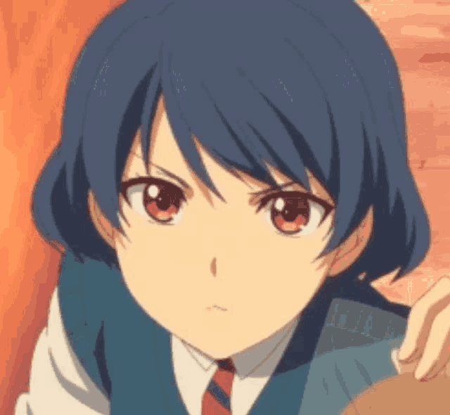 a girl with blue hair and red eyes is wearing a blue vest and red tie .