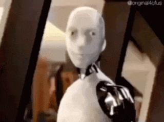 a white robot with a black arm is standing in front of a window .