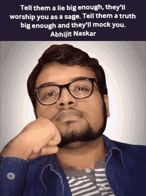 a man with glasses and a beard has a quote from abhijit naskar above him