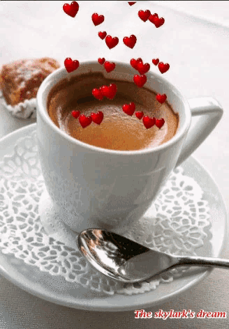 a cup of coffee with hearts coming out of it and the words the skylark 's dream below it