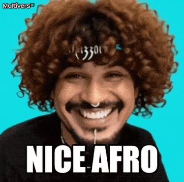 a man with curly hair and a beard is smiling with the words nice afro below him