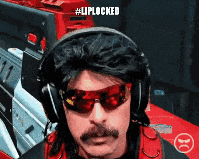 a man wearing headphones and sunglasses has the hashtag #liplocked on his face
