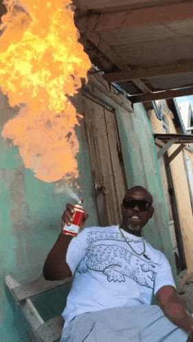 a man in a white shirt with a crocodile on it is holding a can of spray paint