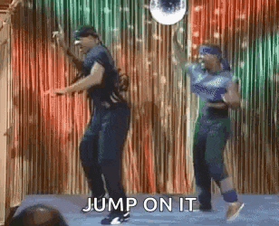 a man and a woman are dancing on a stage with the words `` jump on it '' .