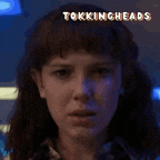 a close up of a woman 's face with the words tockingheads above it