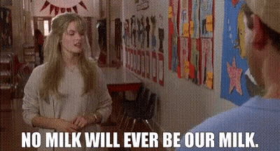 a woman is talking to a man in a school hallway and says `` no milk will ever be our milk '' .