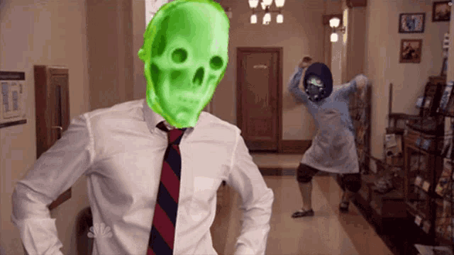 a man in a white shirt and tie with a green skull on his head