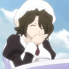 a girl in a white hat is covering her mouth with her hand