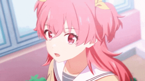 a close up of a girl with pink hair