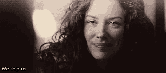 a black and white photo of a smiling woman with the words we-ship-us above her