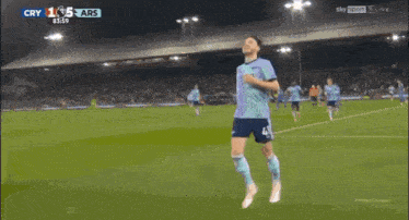 a soccer player with the number 4 on his shorts is running on the field