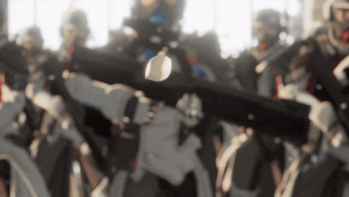 a blurry picture of a man holding a gun