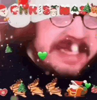 a close up of a person 's face with the word christmas written above it