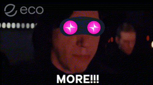a man wearing a mask with pink stars on his eyes screams more