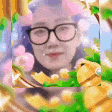 a blurry picture of a woman wearing glasses and a flower in her hair