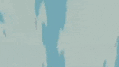 a close up of a person 's face with a blue background and a blue hat .