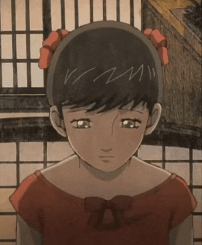a drawing of a girl with a red bow in her hair has the letter m written on her forehead